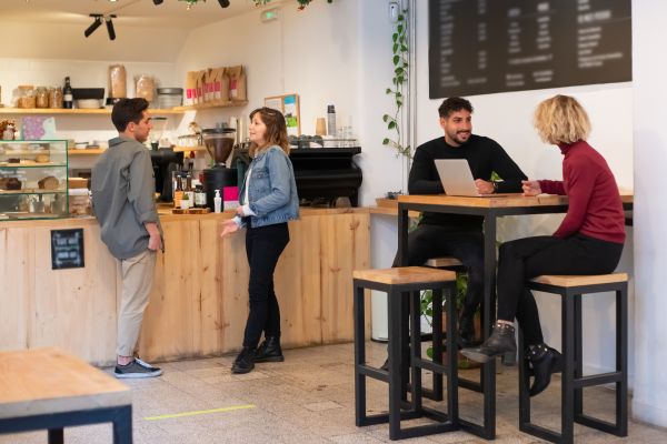 a group of people in a coffee shop